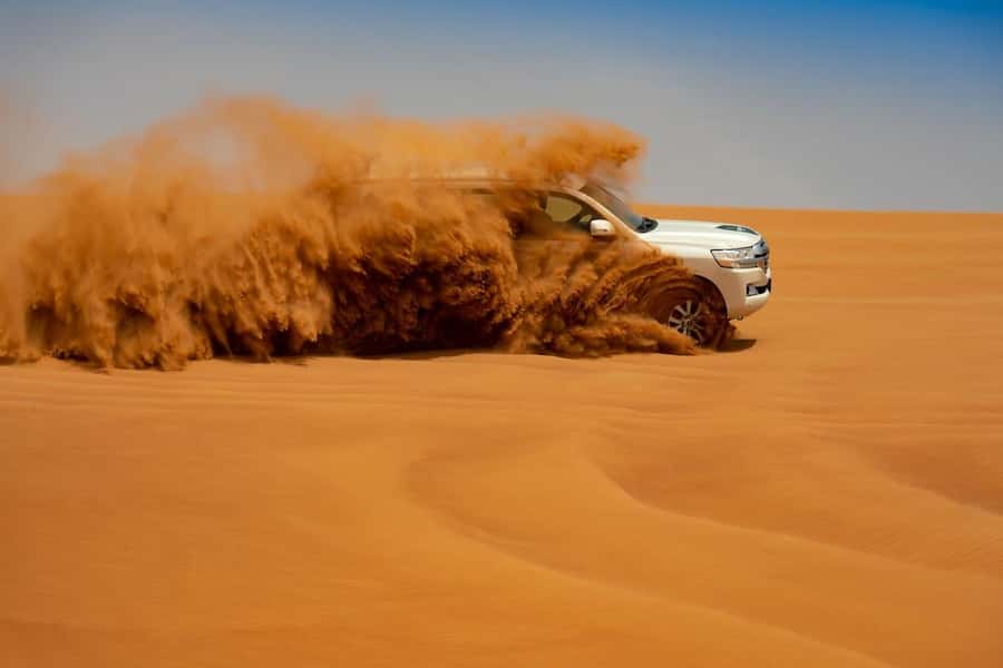Dubai: Desert Safari with BBQ Dinner - The drive from Dubai into the red dunes