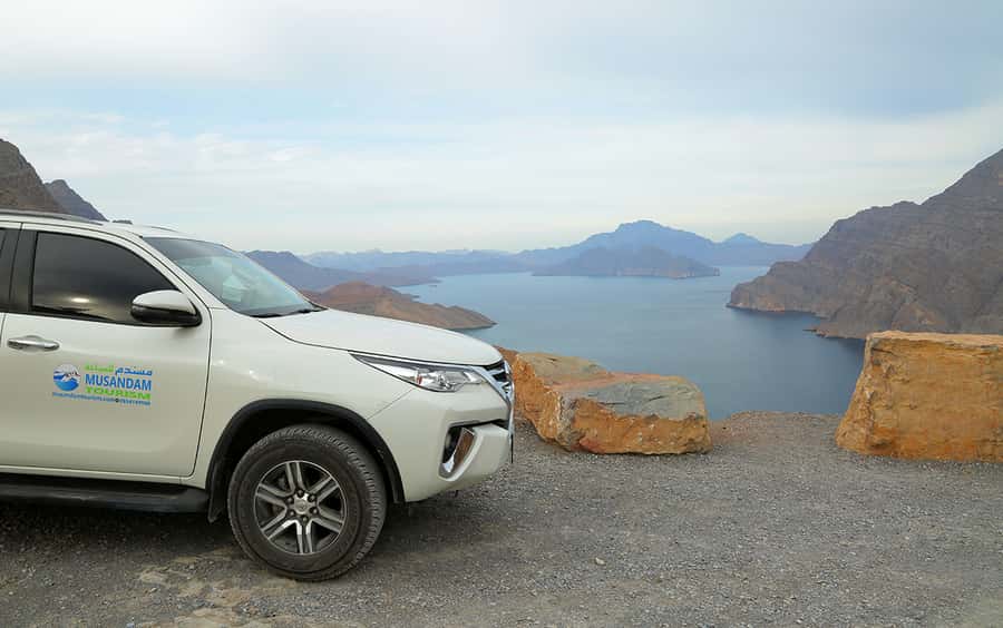 From Dubai: Musandam Khasab Tour with Boat Trip and Safari - Telegraph Island, swimming, and snorkeling