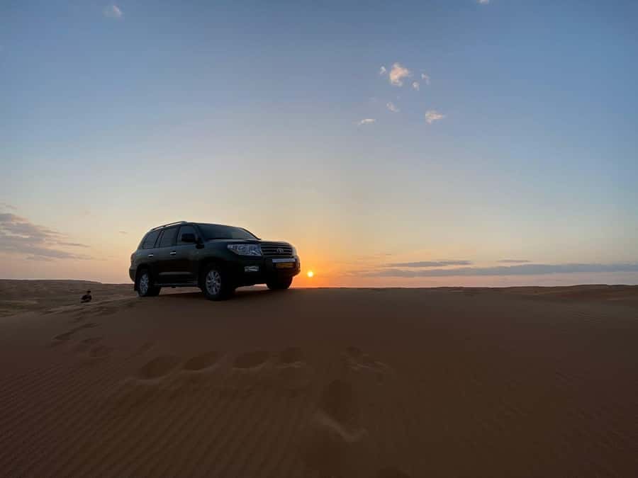 From Muscat: Wahiba Sands Sunset with Desert Camp Dinner - Camel Riding at a Slow Desert Pace