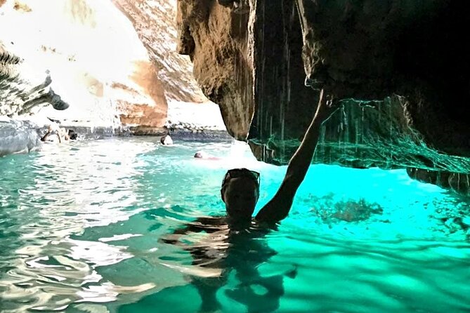 Full Day Group Tour to Wadi Shab Bimmah Sinkhole and Fins Beach - Fins Beach is brief, bright, and worth seeing