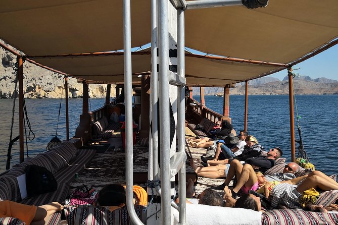 Khasab Dhow cruise-Half day with summing, dolphin watching - Dolphins beside the dhow