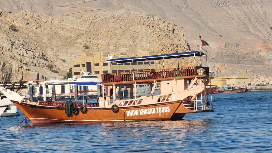 Khasab: Half-Day Dhow Cruise, Dolphin Watching, & Snorkeling - Cruising through Musandam’s steep fjords