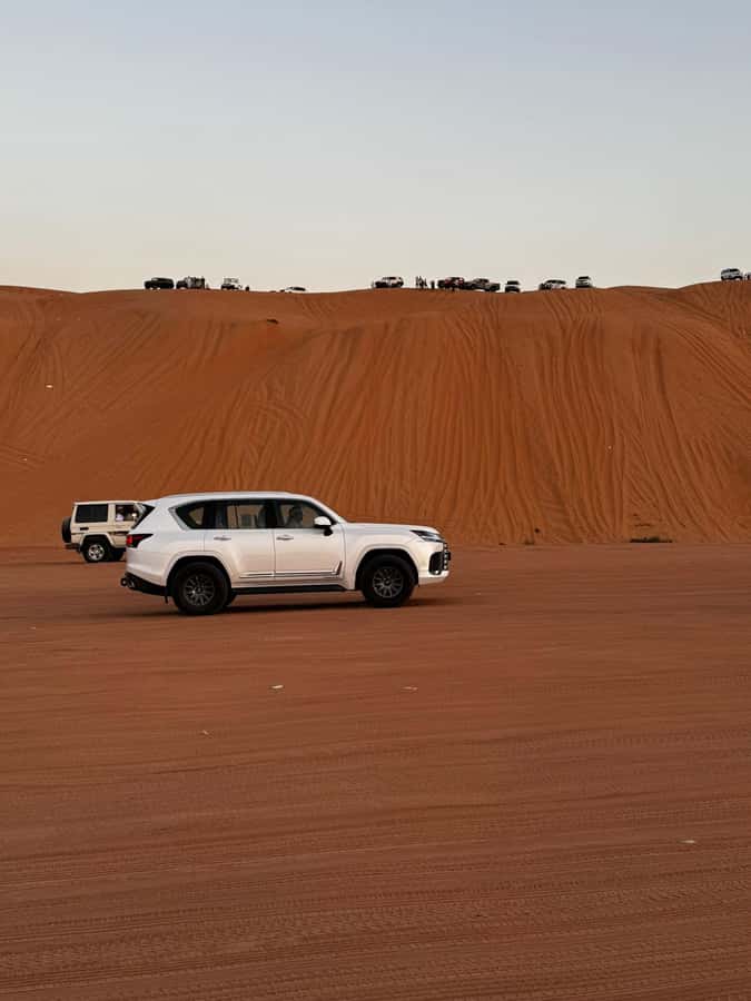 Muscat: Bidiya Desert Sunset Camel Ride with Transfer - Exploring the sand by 4WD