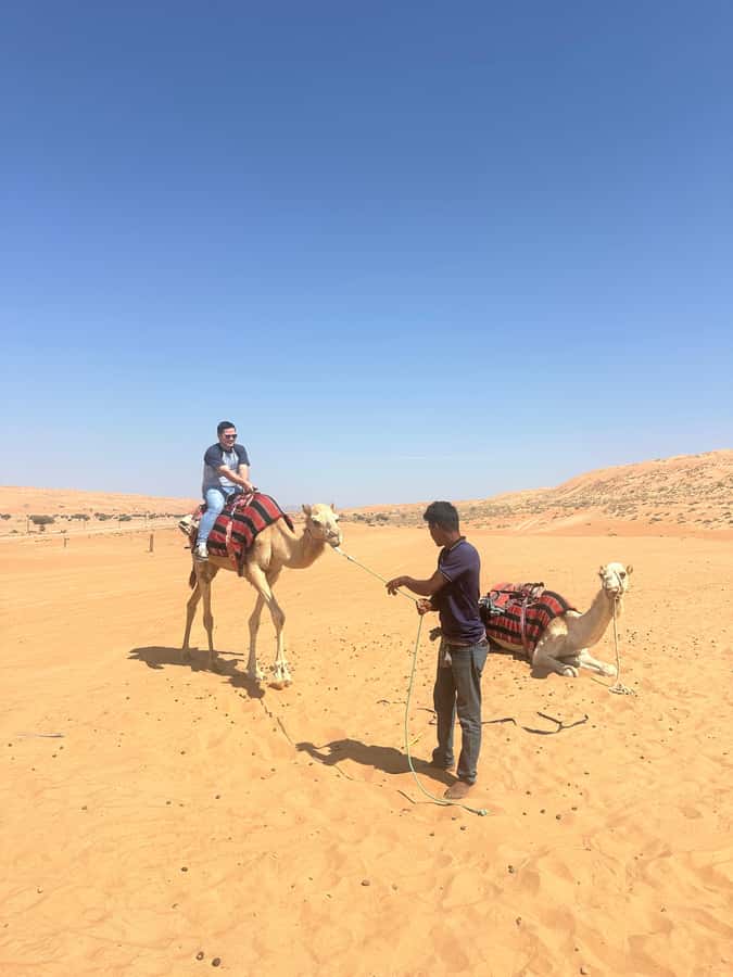 Muscat: Bidiya Desert Sunset Camel Ride with Transfer - Sunset from the dunes