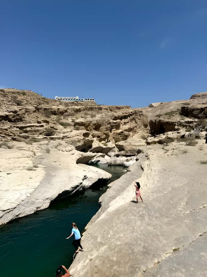 Muscat: Desert & Wadi Bani Khalid Tour with Quad Bike Option - Leaving Muscat in a four-person 4WD