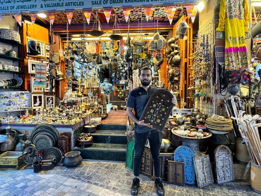 Muscat: Guided Walking Tour of Corniche, Souq & Mutrah Fort - Entering Mutrah Souq and tasting Omani halwa