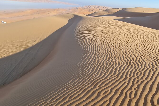 Oman Highlights: Wahiba Sands Desert & Wadi Bani Khalid Tour - Timing, sunset, and the shape of the day
