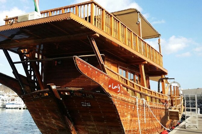 Omani Traditional Dhow Cruise: Sunset and Muscat Coastal View - Passing Al Bustan Palace