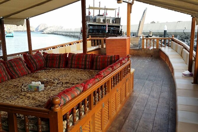 Omani Traditional Dhow Cruise: Sunset and Muscat Coastal View - A glimpse of Al Alam Palace