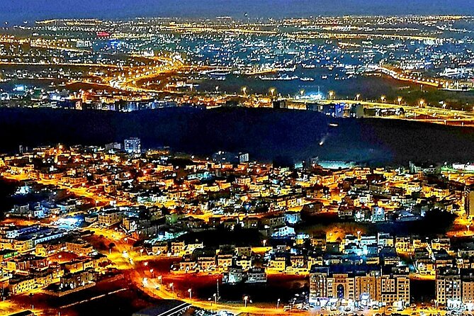 Private Evening Muscat City Tours - Two mosques, seen from the outside at night