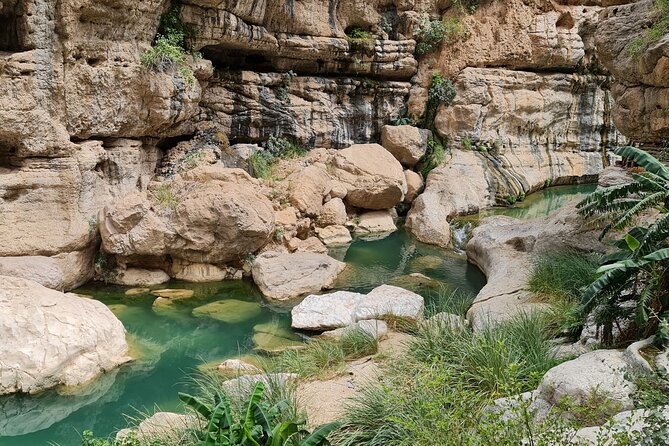 Private Full-Day Wadi Tiwi and Bimmah Sinkhole Tour from Muscat - Bimmah Sinkhole: a short stop with a strong visual payoff