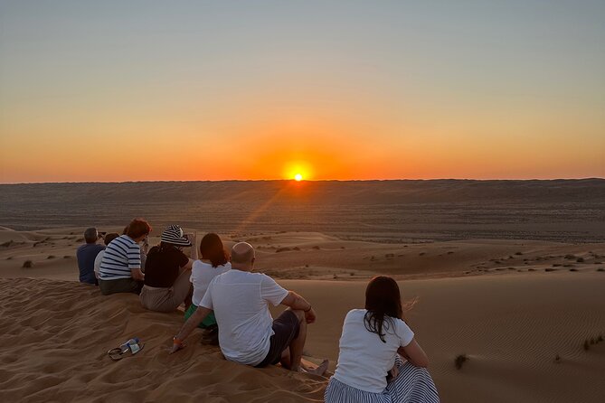 Sunset in Wahiba Sands 4x4 Adventure - Omani dinner at a desert camp