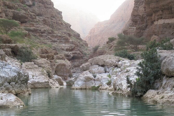 Wadi Shab and Bimmah Sinkhole Full Day Tour - Swimming through the pools and cave