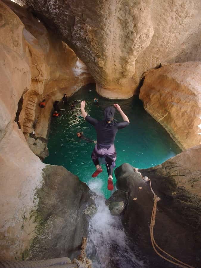 Wadi Shab Parking Meet the Local Guide for Self drivers - Why the cave waterfall is the main event